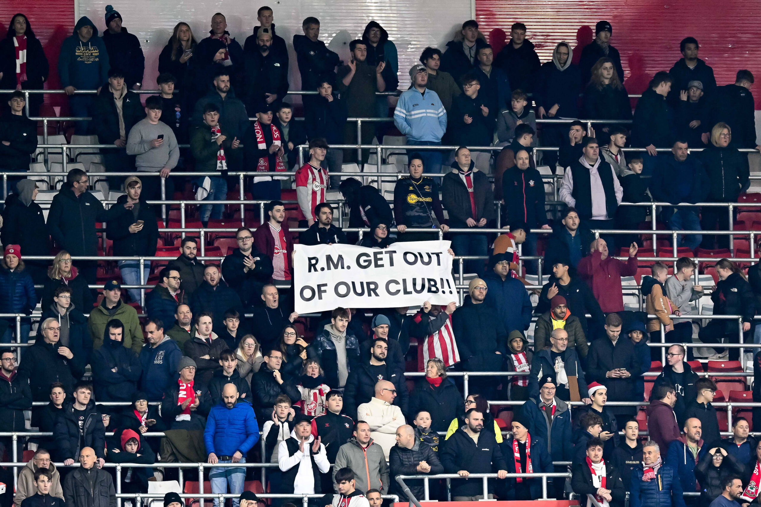 Southampton v Tottenham Hotspur Premier League 15/12/2024. Southampton fans holding up a protest banner against Southampton manager Russell Martin with R.M. Get Out Og Our Club during the Premier League match between Southampton and Tottenham Hotspur at the St Mary s Stadium, Southampton, England on 15 December 2024. Southampton St Mary s Stadium Hampshire England Editorial use only DataCo restrictions apply See www.football-dataco.com , Copyright: xGrahamxHuntx PSI-21074-0185