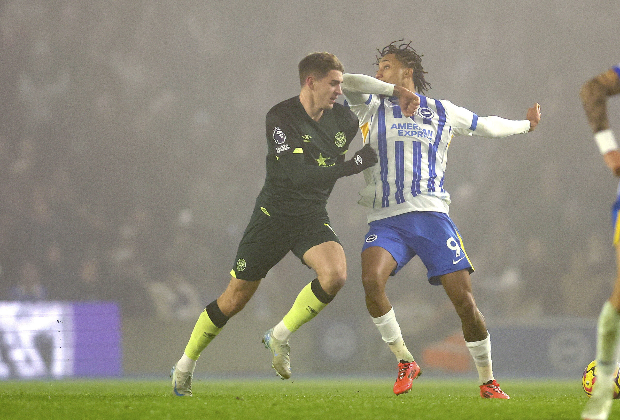 December 27, 2024, Brighton And Hove: Brighton and Hove, England, 27th December 2024. Joao Pedro of Brighton and Hove Albion reacts towards Yehor Yarmolyuk of Brentford after the challenge for the ball during the Premier League match at the AMEX Stadium, Brighton and Hove. (Credit Image: Â© Paul Terry/Sportimage/Cal Sport Media) (Cal Sport Media via AP Images)