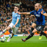 Manchester City v Atalanta BC UEFA Champions League Andrea Masiello of Atalanta BC holds up Phil Foden of Manchester City during the UEFA Champions League match at the Etihad Stadium, Manchester PUBLICATIONxNOTxINxUKxCHN Copyright: xMattxWilkinsonx FIL-13766-0019