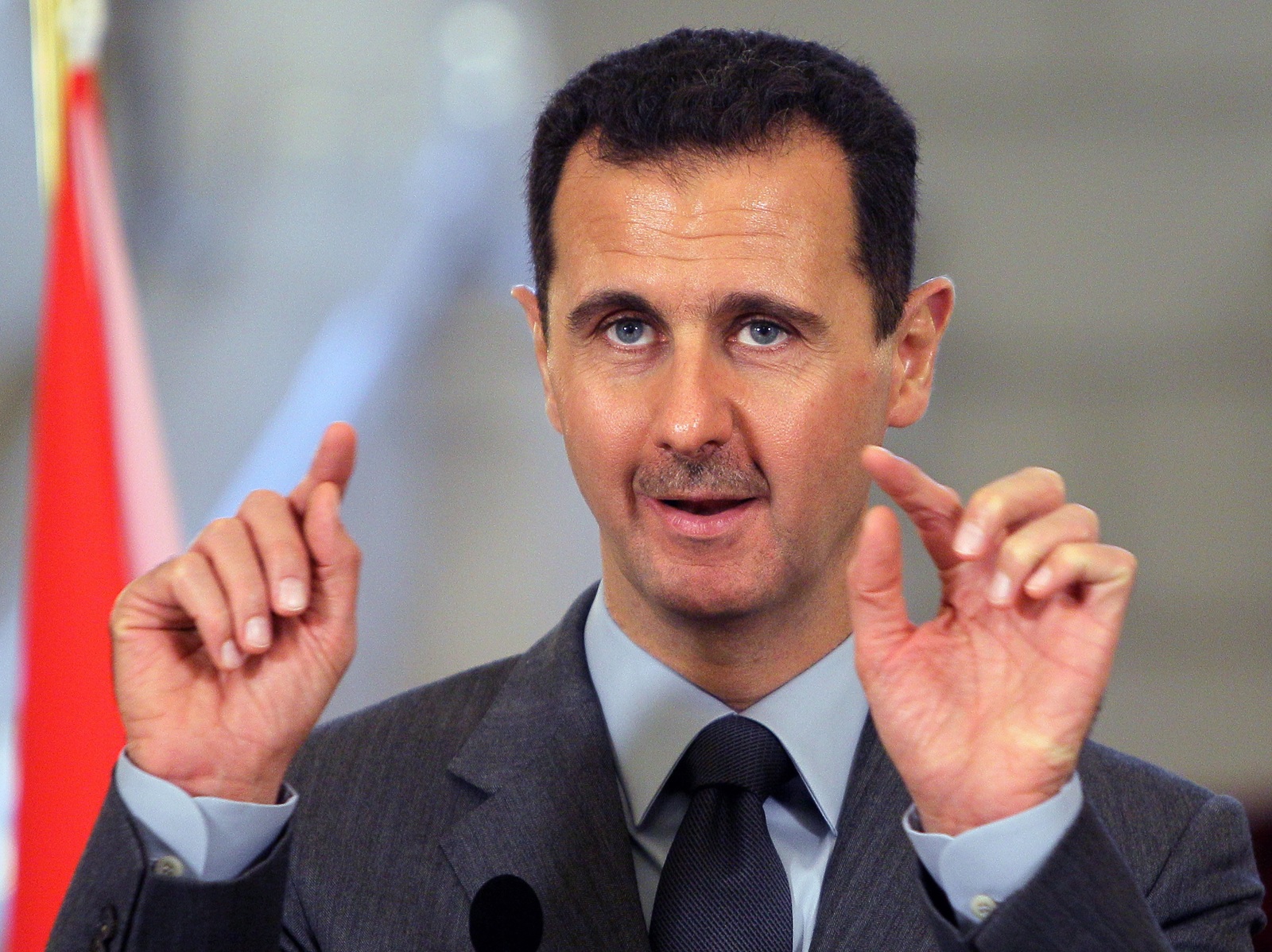 epa11764044 (FILE) - Syrian President Bashar al-Assad gestures while addressing the media during a press conference that concluded his meeting with President Traian Basescu (unseen) in Bucharest, Romania, 10 November 2010 (reissued 08 December 2024). Syrian rebels entered Damascus on 08 December 2024 and announced in a televised statement the 'Liberation of the city of Damascus and the overthrow of Bashar al-Assad', as well as the release of all the prisoners. The rebels also urged the Syrian armed forces to leave Syrian public institutions, which will stay under the control of the outgoing Syrian prime minister until the official handover ceremony.  EPA/Robert Ghement *** Local Caption *** 02439681