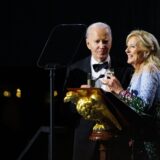 epa11735514 First Lady Jill Biden (R) speaks alongside US President Joe Biden during a dinner of gratitude for long time supporters on the South Lawn of the White House in Washington, DC, USA, 22 November 2024.  EPA/SAMUEL CORUM / POOL