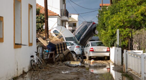 epaselect epa11751465 Cars piled up on a road full of mud following the passage of storm bora in Ialyssos, Rhodes, Greece, 01 December 2024. The island of Rhodes has been in a state of emergency for the last few hours as the bad weather from storm Bora is still ongoing. The road network in the municipal units of Ialyssos and Kallithea has been damaged. Kindergartens, elementary schools, high schools, and high schools in Rhodes will be closed on 02 December 2024.  EPA/LEFTERIS DAMIANIDIS