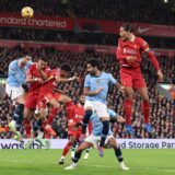 epa11752071 Virgil van Dijk (R) of Liverpool in action during the English Premier League match between Liverpool and Manchester City in Liverpool, Britain, 01 December 2024.  EPA/ADAM VAUGHAN EDITORIAL USE ONLY. No use with unauthorized audio, video, data, fixture lists, club/league logos, 'live' services or NFTs. Online in-match use limited to 120 images, no video emulation. No use in betting, games or single club/league/player publications.