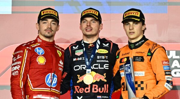 epa11752176 (L-R) Second-placed Scuderia Ferrari driver Charles Leclerc of Monaco, first-placed Red Bull Racing driver Max Verstappen of Netherlands, and third-placed McLaren driver Oscar Piastri of Australia pose on the podium after the Formula 1 Qatar Grand Prix at the Lusail International Circuit racetrack in Lusail, Qatar, 01 December 2024.  EPA/NOUSHAD THEKKAYIL