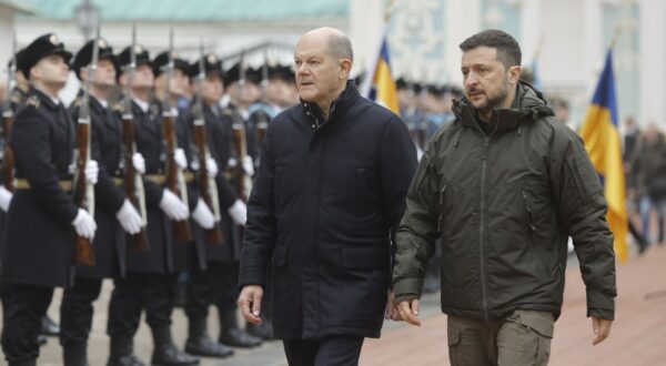 epa11753336 Ukrainian President Volodymyr Zelensky (R) and German Chancellor Olaf Scholz (L) review the Guard of Honor at the St. Sophia Cathedral of the National Reserve 'Sophia of Kyiv' in Kyiv, Ukraine, 02 December 2024. Olaf Scholz arrived in Kyiv to meet with top Ukrainian officials amid the ongoing Russian invasion.  EPA/SERGEY DOLZHENKO 70477