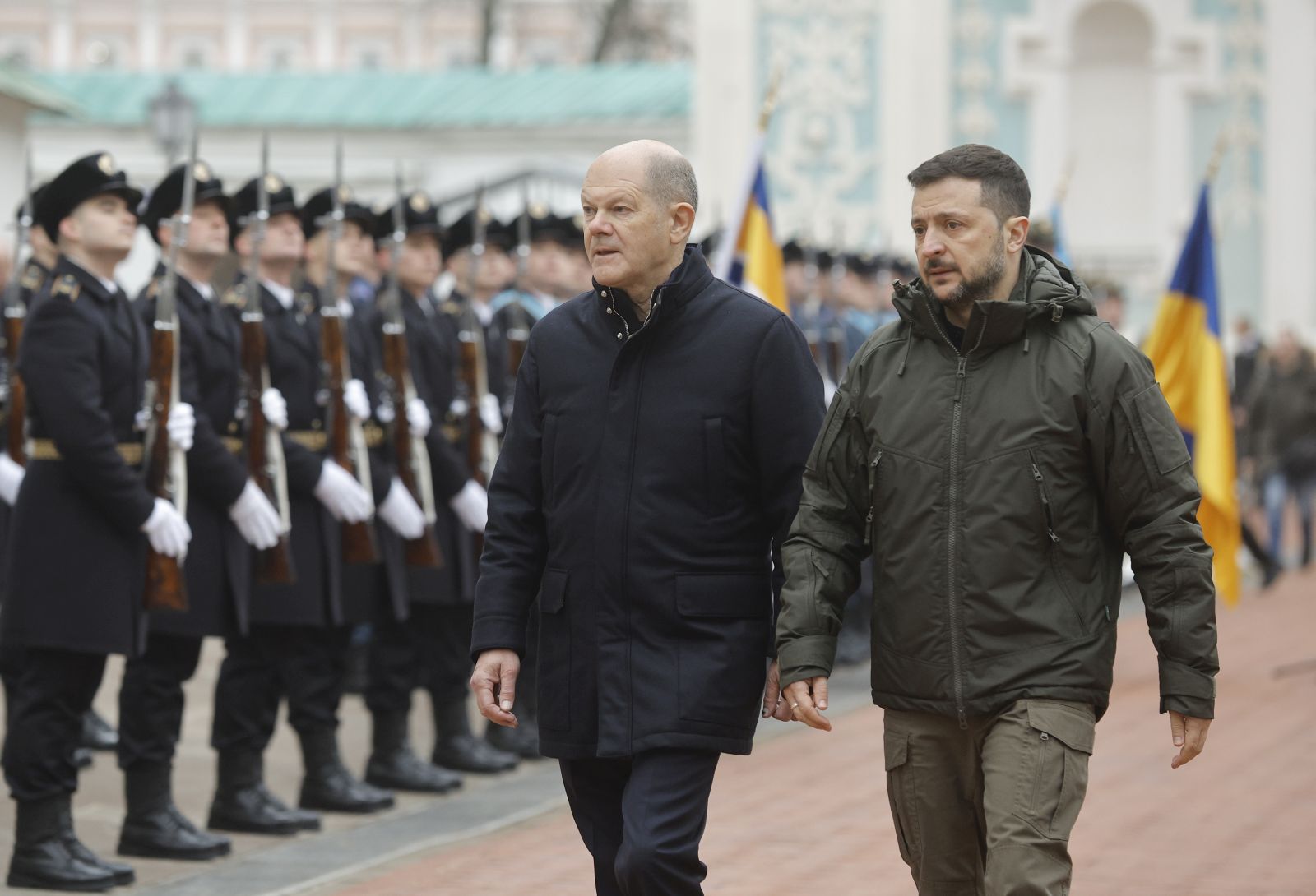 epa11753336 Ukrainian President Volodymyr Zelensky (R) and German Chancellor Olaf Scholz (L) review the Guard of Honor at the St. Sophia Cathedral of the National Reserve 'Sophia of Kyiv' in Kyiv, Ukraine, 02 December 2024. Olaf Scholz arrived in Kyiv to meet with top Ukrainian officials amid the ongoing Russian invasion.  EPA/SERGEY DOLZHENKO 70477