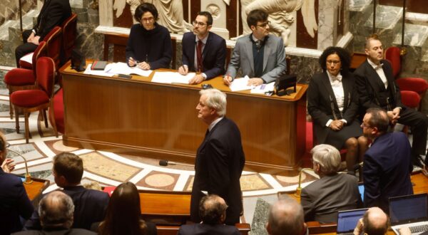 epa11753368 French Prime Minister Michel Barnier (C) attends the French National Assembly debate on parts of France's 2025 budget bill, in Paris, France, 02 December 2024. Prime Minister Barnier activated Article 49.3 of the Constitution to pass his social security budget bill without a vote, as a majority of members of Parliament rejected his project on 02 December 2024.  EPA/MOHAMMED BADRA