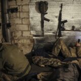 epa11774868 A handout photo made available by the press service of the 24th Mechanized Brigade of the Ukrainian Armed Forces shows servicemen of the artillery unit of 24th Mechanized Brigade resting in a shelter close to their position near Chasiv Yar, Donetsk region, Ukraine, 12 December 2024, (issued 13 December 2024).  EPA/24th Mechanized Brigade HANDOUT  HANDOUT EDITORIAL USE ONLY/NO SALES