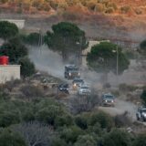 epa11776772 Israeli troops on the Syrian side of the border, between Israel and Syria, near the Druze village of Majdal Shams, in the Israeli-annexed Golan Heights, 14 December 2024. Israel's military said that paratroopers' forces, joined by other troops, are conducting 'defense activities' to prevent 'any threat' and are deployed in key positions within the buffer zone.  EPA/ATEF SAFADI