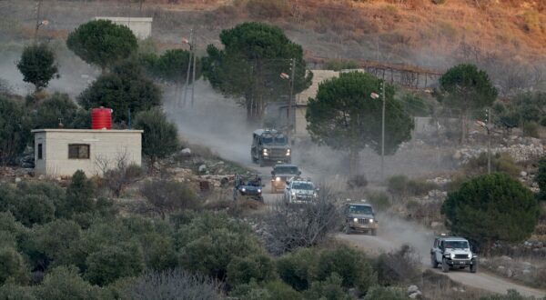 epa11776772 Israeli troops on the Syrian side of the border, between Israel and Syria, near the Druze village of Majdal Shams, in the Israeli-annexed Golan Heights, 14 December 2024. Israel's military said that paratroopers' forces, joined by other troops, are conducting 'defense activities' to prevent 'any threat' and are deployed in key positions within the buffer zone.  EPA/ATEF SAFADI