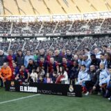 epa11778071 FC Barcelona Legends' Andres Iniesta (C) poses with his family and players after a friendly soccer match between FC Barcelona Legends and Real Madrid Legends at Ajinomoto Stadium, in Tokyo, Japan, 15 December 2024.  EPA/FRANCK ROBICHON