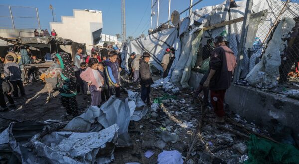 epa11778085 Internally displaced Palestinians inspect destroyed tents inside Al Dura stadium following an Israeli air strike in the west of Deir al-Balah town, central Gaza Strip, 15 December 2024. The Palestinian Ministry of Health in Gaza reported that at least 22 people were killed on December 14 during Israeli airstrikes on the central Gaza Strip. According to the UN, at least 1.9 million people (or nine in ten people) in the Gaza Strip are internally displaced, including people who have been repeatedly displaced. Since October 2023, only about 11 percent of the Gaza Strip has not been placed under Israeli-issued evacuation orders, the UN aid coordination office OCHA said.  EPA/MOHAMMED SABER