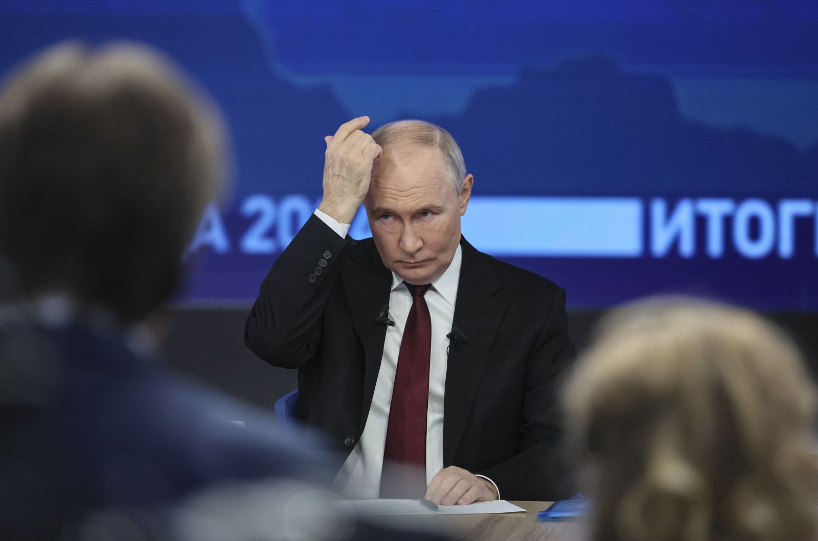 epa11785142 Russian President Vladimir Putin gestures as he answers questions during his annual live broadcast press conference with Russian federal, regional, and foreign media at the Gostiny Dvor forum hall in Moscow, Russia, 19 December 2024. Russian President Vladimir Putin on 19 December holds his end-of-year press conference and the 'Direct Line with Vladimir Putin' televised event, where he will answer citizens' questions focusing on domestic issues.  EPA/YURI KOCHETKOV