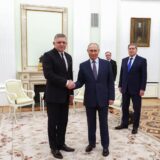 epa11790244 Russian President Vladimir Putin (C) shakes hands with Slovak Prime Minister Robert Fico (L) during their meeting at the Kremlin in Moscow, Russia, 22 December 2024. Fico is on a working visit to Moscow.  EPA/ARTYOM GEODAKYAN/SPUTNIK/KREMLIN / POOL