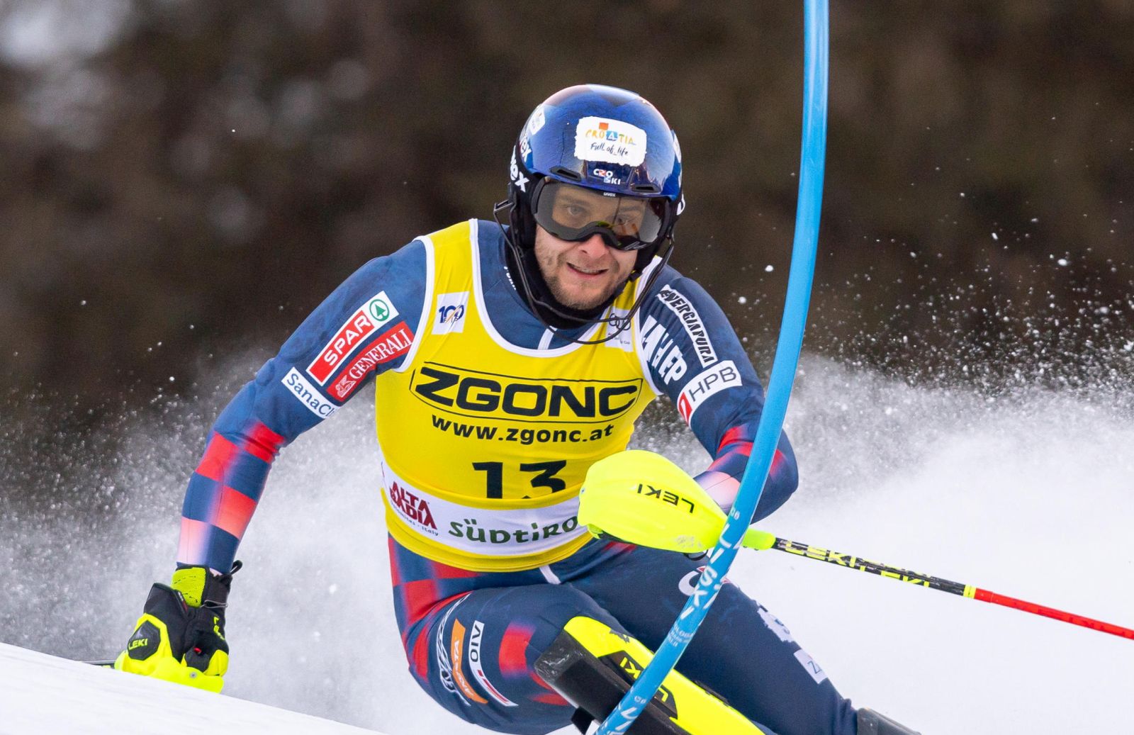 epa11790909 Samuel Kolega of Croatia in action during the first run of the Men's Slalom race of the Alpine Skiing World Cup in Alta Badia, Italy, 23 December 2024.  EPA/ANDREA SOLERO