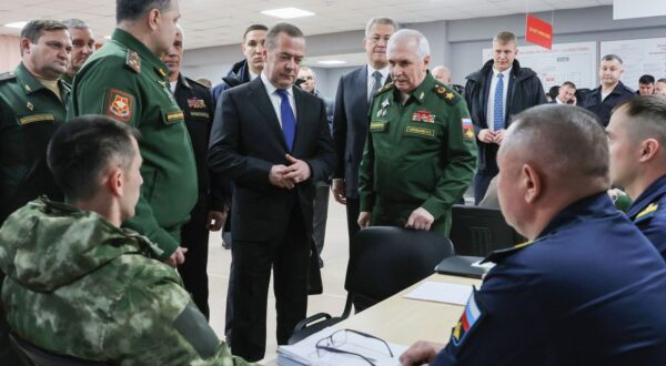 epa11791923 Russian Security Council, United Russia Party Chairman Dmitry Medvedev (C) visits the Unified Center for Selecting Citizens for Military Service under the 'Defender' Contract in Ufa, Russia, 24 December 2024.  EPA/EKATERINA SHTUKINA / SPUTNIK / GOVERNMENT / POOL