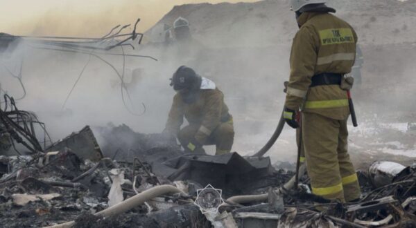 epa11792900 A handout photo made available by the press service of the Ministry for Emergency Situations of Kazakhstan shows emergency specialists working at the crash site of a passenger plane near Aktau, Kazakhstan, 25 December 2024. Azerbaijan Airlines Embraer ERJ-190AR passenger plane flying from Baku to Grozny crashed some three kilometres away from the city of Aktau. According to preliminary information, the incident was caused by a collision between the aircraft and a flock of birds.  EPA/KAZAKHSTAN EMERGENCIES MINISTRY HANDOUT -- BEST QUALITY AVAILABLE -- MANDATORY CREDIT -- HANDOUT EDITORIAL USE ONLY/NO SALES