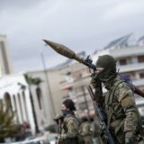 epa11794983 Syrian opposition fighters march during a military parade in Damascus, Syria, 27 December 2024. Members of Hay'at Tahrir al-Sham (HTS) began marching from abbasieen Square, passing through some of the Damascene neighborhoods, and arrived at Umayyad Square in a parade organized to send a message of strength and reassurance to the people, according to HTS.