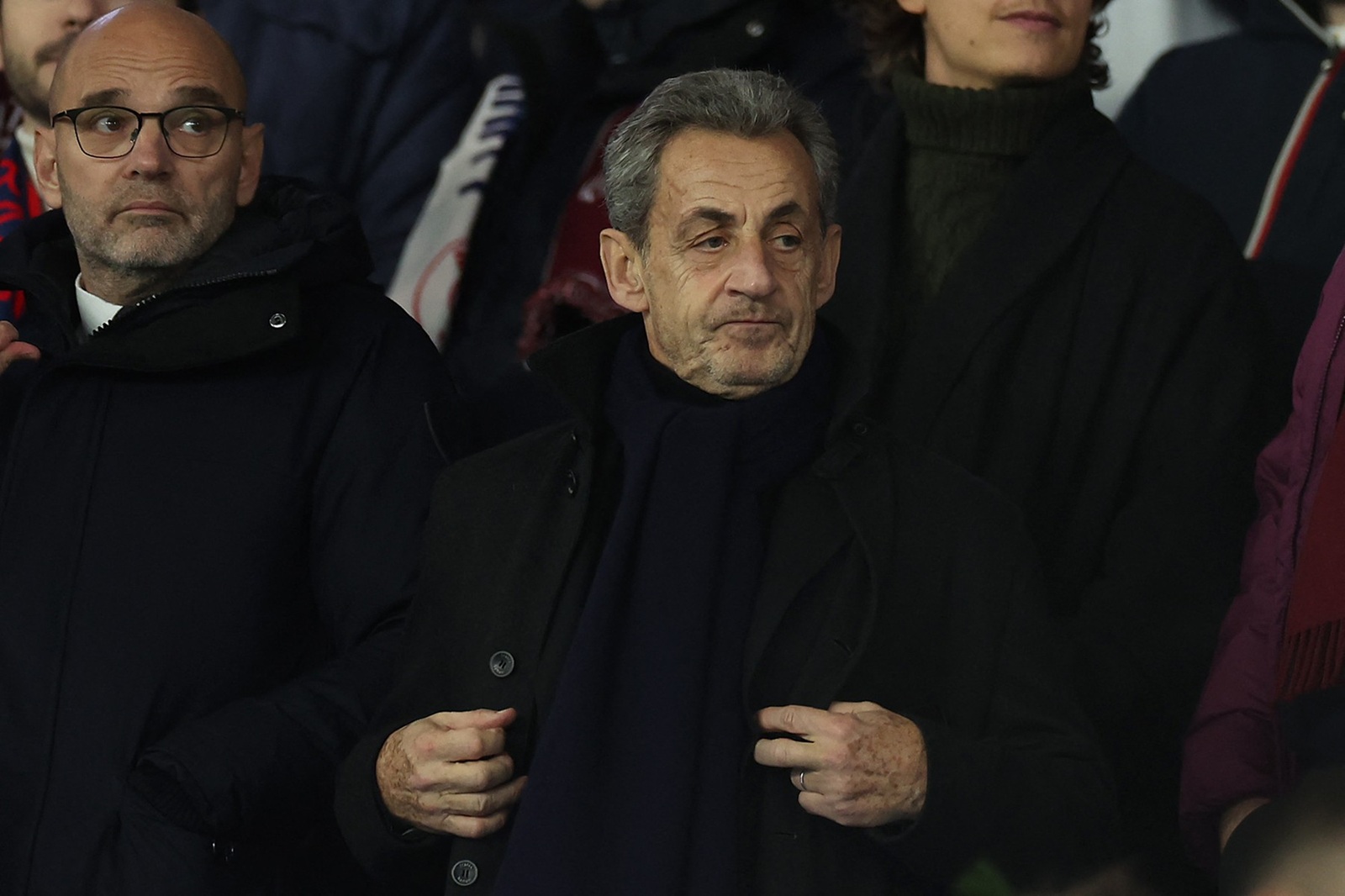 Former French President Nicolas Sarkozy (C) looks on from the stands ahead of the French L1 football match between Paris Saint-Germain and Olympique Lyonnais at the Parc des Princes stadium in Paris on December 15, 2024.,Image: 947100167, License: Rights-managed, Restrictions: , Model Release: no, Credit line: FRANCK FIFE / AFP / Profimedia