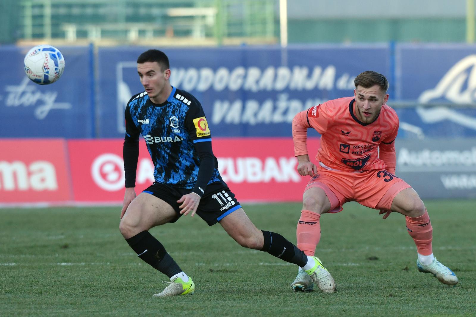 15.12.2024., stadion Varteks, Varazdin - SuperSport HNL, 17. kolo, NK Varazdin - NK Osijek. Michele Sego, Nail Omerovic.  Photo: Vjeran Zganec Rogulja/PIXSELL