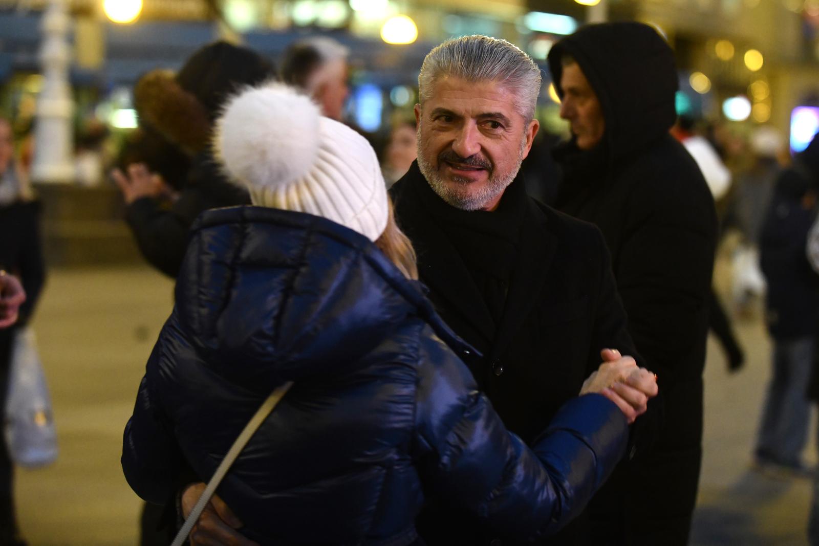 23.12.2024., Zagreb, Hrvatska - Niko Tokic Kartelo, predsjednicki kandidat, odrzao predizborni skup na trgu. Photo: Josip Mikacic/PIXSELL