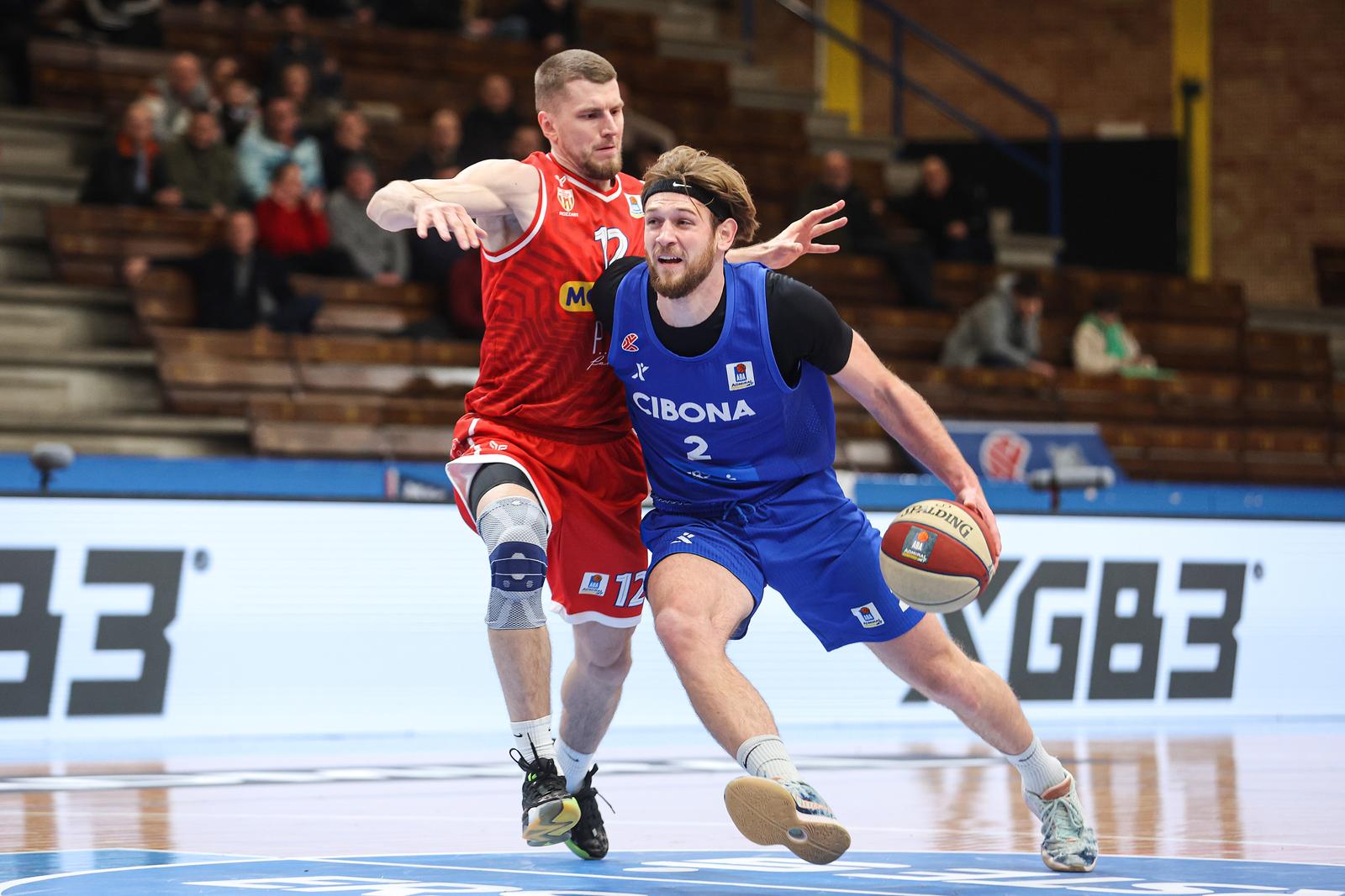 27.12.2024., SD Suzinska vrela, Zagreb - Utakmica 14. kolo ABA liga: KK Cibona - KK Borac Mozzart. Toni Rocak, Justas Furmanavisius Photo: Luka Stanzl/PIXSELL