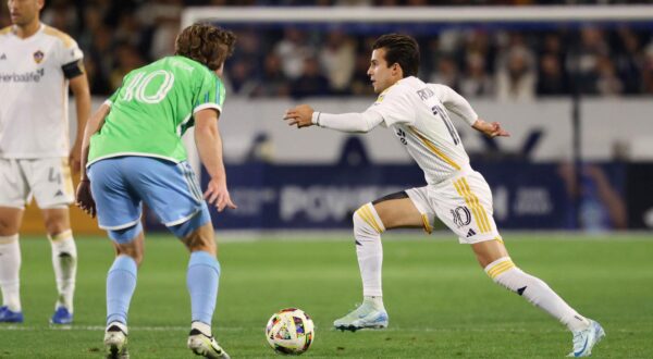 Nov 30, 2024; Carson, California, USA; LA Galaxy midfielder Riqui Puig (10) controls the ball against Seattle Sounders FC forward Pedro De La Vega (10) in the first half in the 2024 MLS Cup Western Conference Final match at Dignity Health Sports Park. Mandatory Credit: Kiyoshi Mio-Imagn Images Photo: Kiyoshi Mio/REUTERS