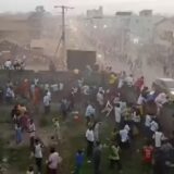 People scramble in Nzerekore, Guinea, where local officials said a deadly stampede ensued at a stadium following fan clashes during a soccer match, December 1, 2024, in this still image obtained from a social media video. Social media via REUTERS THIS IMAGE HAS BEEN SUPPLIED BY A THIRD PARTY. NO RESALES. NO ARCHIVES Photo: SOCIAL MEDIA/REUTERS