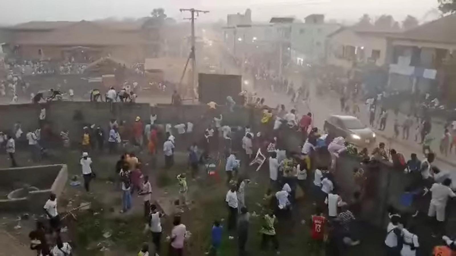 People scramble in Nzerekore, Guinea, where local officials said a deadly stampede ensued at a stadium following fan clashes during a soccer match, December 1, 2024, in this still image obtained from a social media video. Social media via REUTERS THIS IMAGE HAS BEEN SUPPLIED BY A THIRD PARTY. NO RESALES. NO ARCHIVES Photo: SOCIAL MEDIA/REUTERS