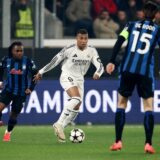 Soccer Football - Champions League - Atalanta v Real Madrid - Gewiss Stadium, Bergamo, Italy - December 10, 2024 Real Madrid's Kylian Mbappe in action with Atalanta's Ademola Lookman REUTERS/Guglielmo Mangiapane Photo: GUGLIELMO MANGIAPANE/REUTERS