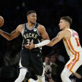 Dec 14, 2024; Las Vegas, Nevada, USA; Milwaukee Bucks forward Giannis Antetokounmpo (34) controls the ball against Atlanta Hawks guard Bogdan Bogdanovic (13) during the second quarter in a semifinal of the 2024 Emirates NBA Cup at T-Mobile Arena. Mandatory Credit: Kyle Terada-Imagn Images Photo: Kyle Terada/REUTERS