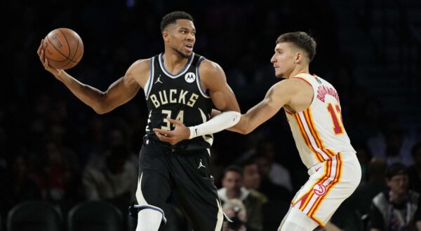 Dec 14, 2024; Las Vegas, Nevada, USA; Milwaukee Bucks forward Giannis Antetokounmpo (34) controls the ball against Atlanta Hawks guard Bogdan Bogdanovic (13) during the second quarter in a semifinal of the 2024 Emirates NBA Cup at T-Mobile Arena. Mandatory Credit: Kyle Terada-Imagn Images Photo: Kyle Terada/REUTERS