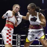 Boxing - Natasha Jonas v Ivana Habazin - IBF & WBC World Welterweight Titles - The Exhibition Centre Liverpool, Liverpool, Britain - December 14, 2024 Natasha Jonas in action against Ivana Habazin during their welterweight world titles fight Action Images via Reuters/Jason Cairnduff Photo: Jason Cairnduff/REUTERS