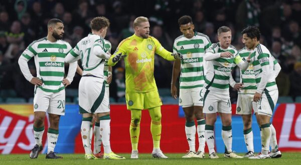 Soccer Football - Champions League - Celtic v Club Brugge - Celtic Park, Glasgow, Scotland, Britain - November 27, 2024 Celtic's Kasper Schmeichel and Callum McGregor speak to teammates as Cameron Carter-Vickers looks dejected after scoring an own goal for Club Brugge's first Action Images via Reuters/Jason Cairnduff Photo: Jason Cairnduff/REUTERS