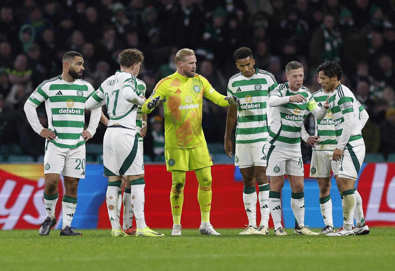 Soccer Football - Champions League - Celtic v Club Brugge - Celtic Park, Glasgow, Scotland, Britain - November 27, 2024 Celtic's Kasper Schmeichel and Callum McGregor speak to teammates as Cameron Carter-Vickers looks dejected after scoring an own goal for Club Brugge's first Action Images via Reuters/Jason Cairnduff Photo: Jason Cairnduff/REUTERS