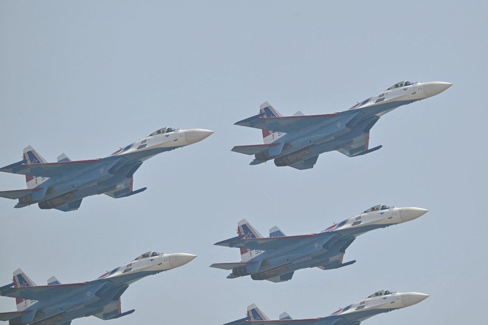 The Russian Warriors aerobatic team performs during the 15th China International Aviation and Aerospace Exhibition in Zhuhai, in south China's Guangdong province on November 12, 2024. The 15th China International Aviation and Aerospace Exhibition, held in the southern city of Zhuhai, will showcase military fighters, passenger jets, drones and weapons systems, some for the first time in public.,Image: 933336390, License: Rights-managed, Restrictions: , Model Release: no, Credit line: HECTOR RETAMAL / AFP / Profimedia