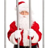 Studio shot of Santa Claus standing in a jail cell behind bars isolated on white background,Image: 269479781, License: Royalty-free, Restrictions: , Model Release: yes, Credit line: LJSphotography / Alamy / Alamy / Profimedia