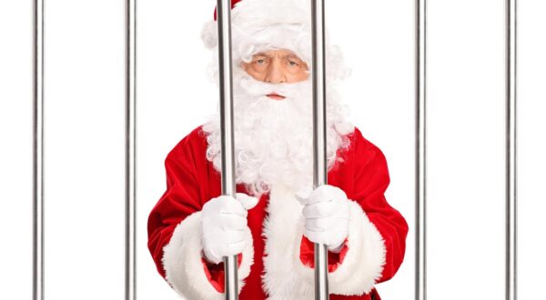 Studio shot of Santa Claus standing in a jail cell behind bars isolated on white background,Image: 269479781, License: Royalty-free, Restrictions: , Model Release: yes, Credit line: LJSphotography / Alamy / Alamy / Profimedia