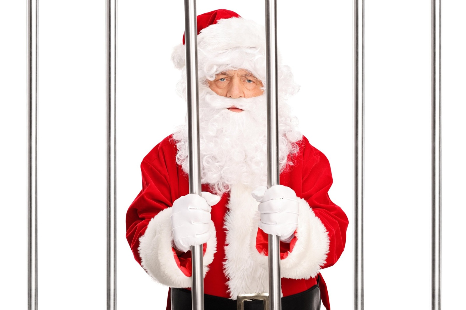 Studio shot of Santa Claus standing in a jail cell behind bars isolated on white background,Image: 269479781, License: Royalty-free, Restrictions: , Model Release: yes, Credit line: LJSphotography / Alamy / Alamy / Profimedia