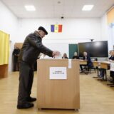 epaselect epa11751057 An elderly man casts his ballot at a polling station in Mogosoaia, Romania, 01 December 2024. Approximately 18 million Romanian citizens are expected at the polling stations this weekend for choosing the bicameral parliament members, according to the Permanent Electoral Authority (AEP), of which 989,230 people can express their intention abroad.  EPA/ROBERT GHEMENT