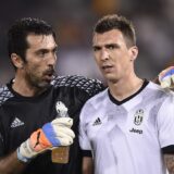 - 
23/12/2016 Doha ( Qatar)
Sport Calcio
Supercoppa italiana 2016 Juventus - Milan
Nella foto: Gianluigi Buffon , Mario Mandzukic

 - 
23 December 2016 Doha ( Qatar )
Sport Soccer
Supercoppa italiana 2016 Juventus - Milan 
In the pic: Gianluigi Buffon , Mario Mandzukic,Image: 309379644, License: Rights-managed, Restrictions: , Model Release: no, Credit line: Daniele Badolato / LaPresse / Profimedia