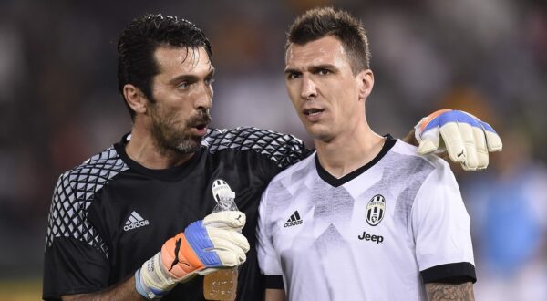 - 
23/12/2016 Doha ( Qatar)
Sport Calcio
Supercoppa italiana 2016 Juventus - Milan
Nella foto: Gianluigi Buffon , Mario Mandzukic

 - 
23 December 2016 Doha ( Qatar )
Sport Soccer
Supercoppa italiana 2016 Juventus - Milan 
In the pic: Gianluigi Buffon , Mario Mandzukic,Image: 309379644, License: Rights-managed, Restrictions: , Model Release: no, Credit line: Daniele Badolato / LaPresse / Profimedia