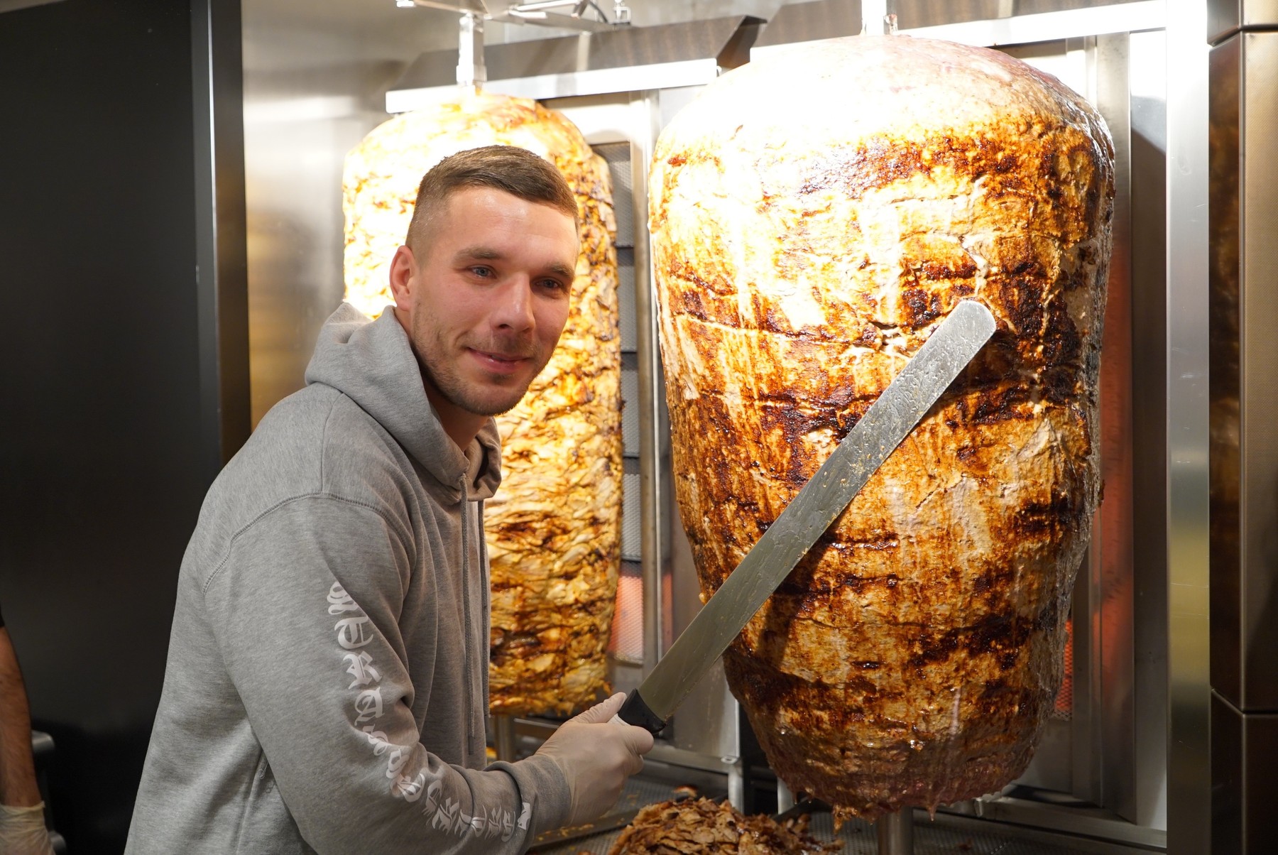 COLOGNE, GERMANY - JANUARY 06 : German footballer Lukas Podolski poses for a photo with a doner knife as he opened up a Doner Kebab Restaurant called "Mangal Doner" with two other partners in Cologne, Germany on January 06, 2018. Mesut Zeyrek / Anadolu Agency,Image: 359373658, License: Rights-managed, Restrictions: , Model Release: no, Credit line: AA/ABACA / Abaca Press / Profimedia