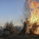 Trees burn next to a Ukrainian military vehicle, after white phosphorus munitions exploded in the air, at the village of Chasiv Yar near Bakhmut, on March 14, 2023, amid the Russian invasion of Ukraine.,Image: 762771122, License: Rights-managed, Restrictions: , Model Release: no, Credit line: Aris Messinis / AFP / Profimedia