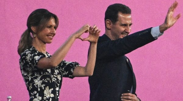 Syria's President Bashar al-Assad (C) and his wife Asma al-Assad (L) attend the opening ceremony of the 2022 Asian Games at the Hangzhou Olympic Sports Centre Stadium in Hangzhou in China's eastern Zhejiang province on September 23, 2023.,Image: 807728856, License: Rights-managed, Restrictions: , Model Release: no, Credit line: Philip FONG / AFP / Profimedia