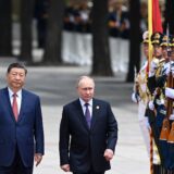 In this pool photograph distributed by the Russian state agency Sputnik, Russia's President Vladimir Putin and China's President Xi Jinping attend an official welcoming ceremony in front of the Great Hall of the People in Tiananmen Square in Beijing on May 16, 2024.,Image: 873449185, License: Rights-managed, Restrictions: ** Editor's note : this image is distributed by Russian state owned agency Sputnik **, Model Release: no, Credit line: Sergei BOBYLYOV / AFP / Profimedia