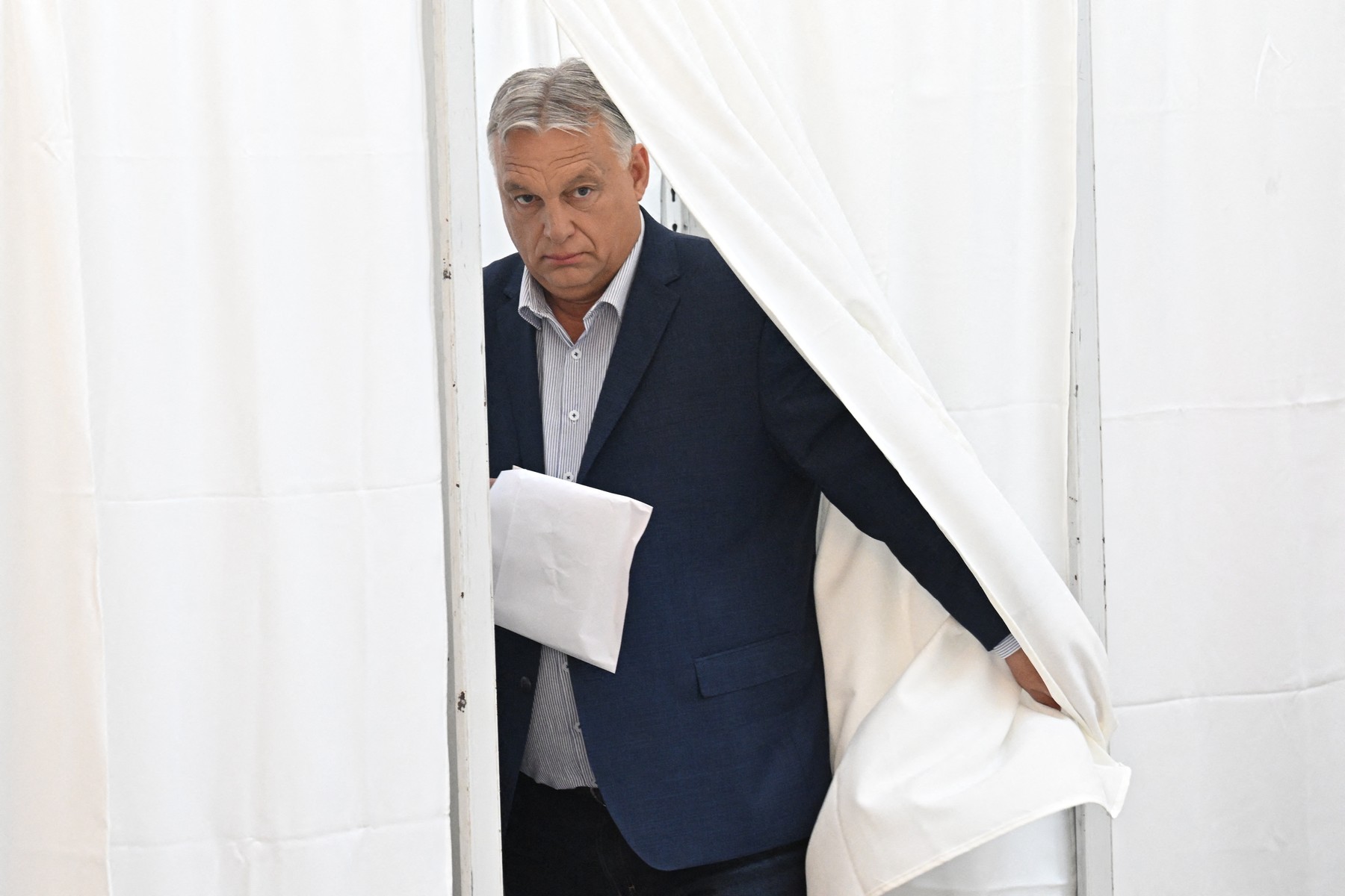 Hungarian Prime Minister Viktor Orban exits a polling booth to cast his ballot at a polling station located in a school in Budapest during the European and local elections on June 9, 2024.,Image: 880080785, License: Rights-managed, Restrictions: , Model Release: no, Credit line: Attila KISBENEDEK / AFP / Profimedia