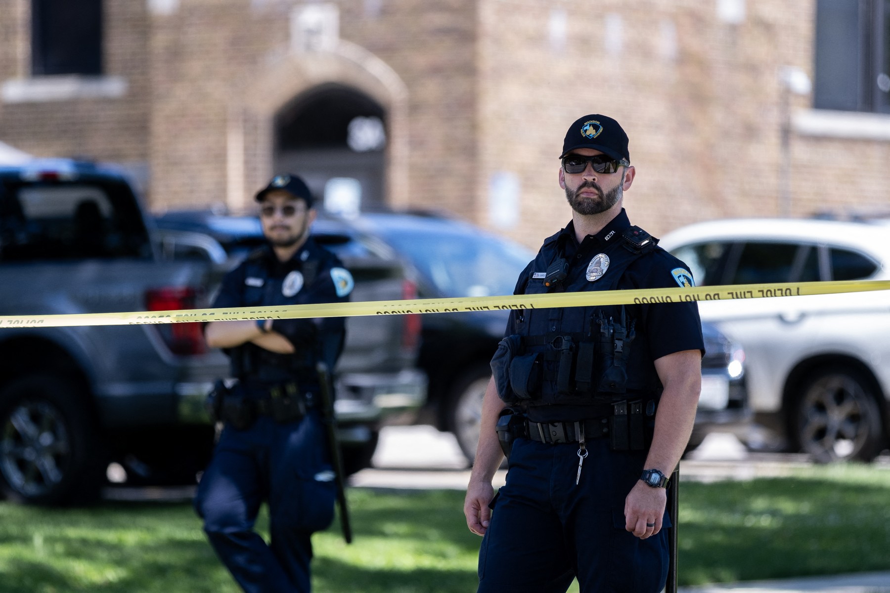 MADISON, WISCONSIN - JULY 5: Police stand guard outside of Sherman Middle School where US President Joe Biden held a rally on July 5, 2024 in Madison, Wisconsin. Following the rally Biden was expected to sit down for a network interview which is expected to air during prime time as the campaign scrambles to do damage control after Biden's poor performance at last week's debate.   Jim Vondruska,Image: 887595591, License: Rights-managed, Restrictions: , Model Release: no, Credit line: Jim Vondruska / Getty images / Profimedia