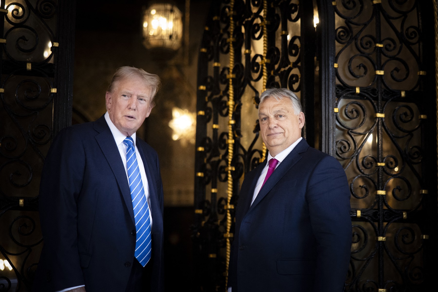 In this handout photograph taken and released by the Hungarian Prime Minister's Office on July 11, 2024, Hungary's Prime Minister Viktor Orban (R) poses with former US president Donald Trump at Trump's estate in Mar-a-Lago in Palm Beach, Florida. 
 Hungary's Prime Minister Viktor Orban flew to Florida on July 11, 2024, to meet with former US President Donald Trump after the end of the NATO summit in Washington D.C.,Image: 889203948, License: Rights-managed, Restrictions: RESTRICTED TO EDITORIAL USE - MANDATORY CREDIT "AFP PHOTO /Hungary's Prime Minister's Office/Miniszterelnöki Sajtóiroda " - NO MARKETING NO ADVERTISING CAMPAIGNS - DISTRIBUTED AS A SERVICE TO CLIENTS, ***
HANDOUT image or SOCIAL MEDIA IMAGE or FILMSTILL for EDITORIAL USE ONLY! * Please note: Fees charged by Profimedia are for the Profimedia's services only, and do not, nor are they intended to, convey to the user any ownership of Copyright or License in the material. Profimedia does not claim any ownership including but not limited to Copyright or License in the attached material. By publishing this material you (the user) expressly agree to indemnify and to hold Profimedia and its directors, shareholders and employees harmless from any loss, claims, damages, demands, expenses (including legal fees), or any causes of action or allegation against Profimedia arising out of or connected in any way with publication of the material. Profimedia does not claim any copyright or license in the attached materials. Any downloading fees charged by Profimedia are for Profimedia's services only. * Handling Fee Only 
***, Model Release: no, Credit line: ZOLTAN FISCHER / AFP / Profimedia