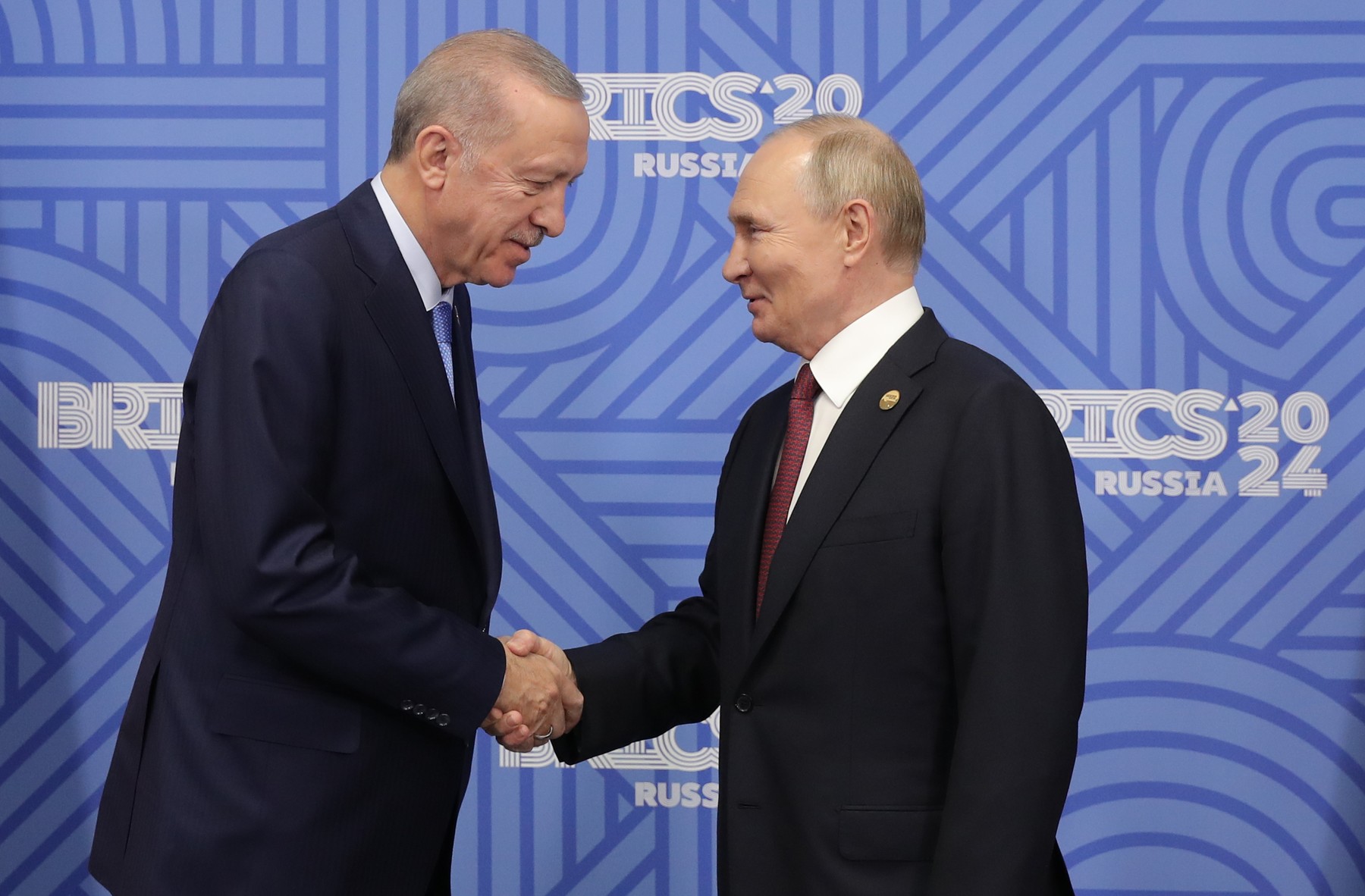 8790943 23.10.2024 President of Russia Vladimir Putin, right, and President of Turkiye Recep Tayyip Erdogan during their meeting on the sidelines of the 16th BRICS Summit in Kazan, Russia. Images can be used on the condition that the photographer’s name and source are mentioned in the following order: “name of the photographer / brics-russia2024.ru host photo agency.”  / Photohost agency brics-russia2024.ru,Image: 925511221, License: Rights-managed, Restrictions: Editors' note: THIS IMAGE IS PROVIDED BY RUSSIAN STATE-OWNED AGENCY SPUTNIK., Model Release: no, Credit line: Anatoly Medved / Sputnik / Profimedia